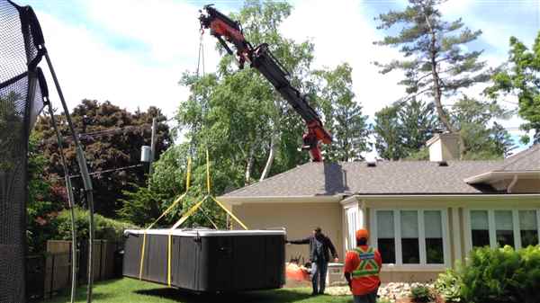 Crane Swim Spa into backyard