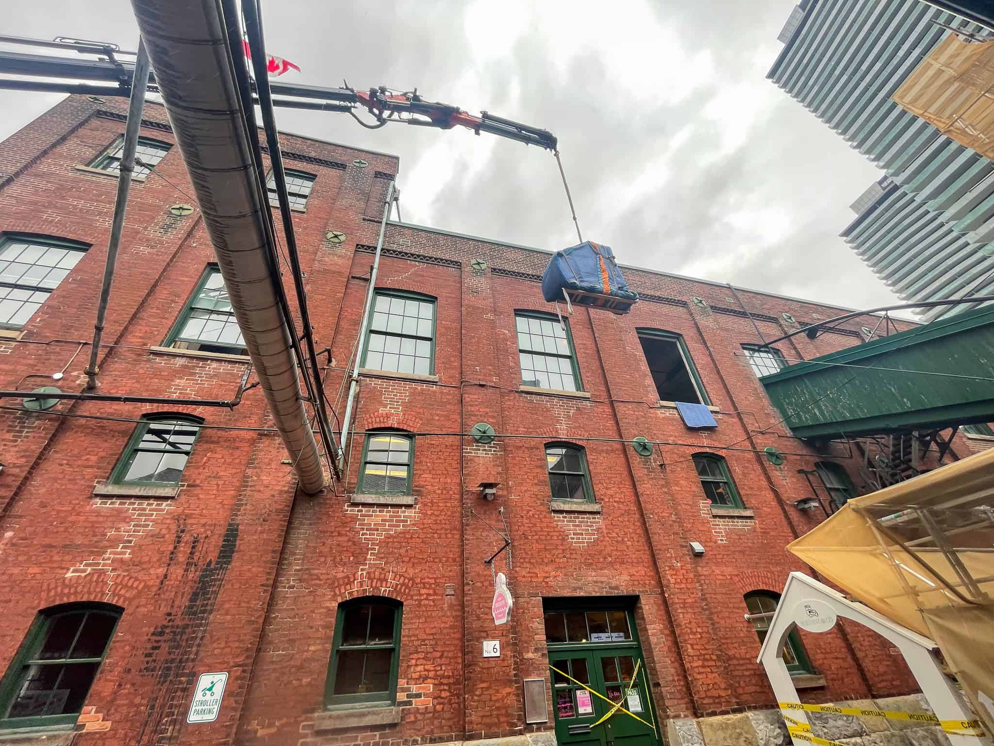 Crane grand piano in distillery district of Toronto.