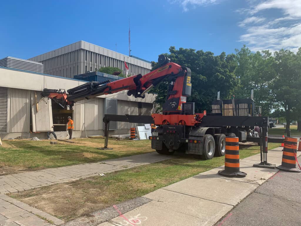 Knuckle cranes can allow for precision placing of concrete walls.