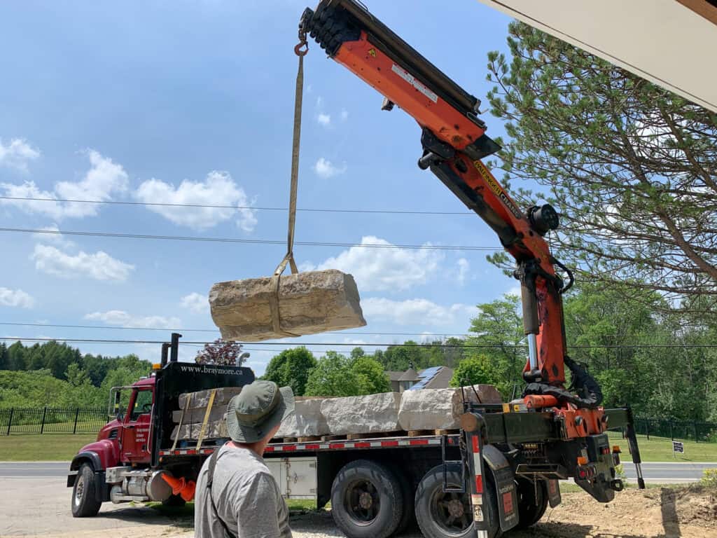 Lifting large armor rocks with crane