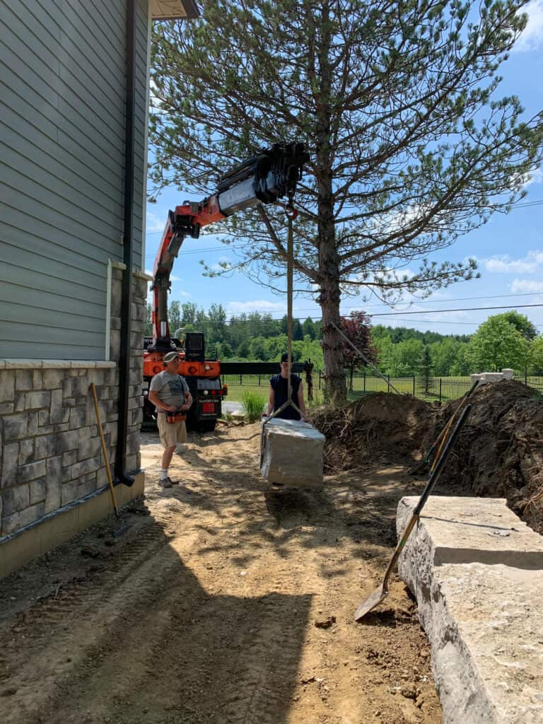 Lifting large armor rocks with crane