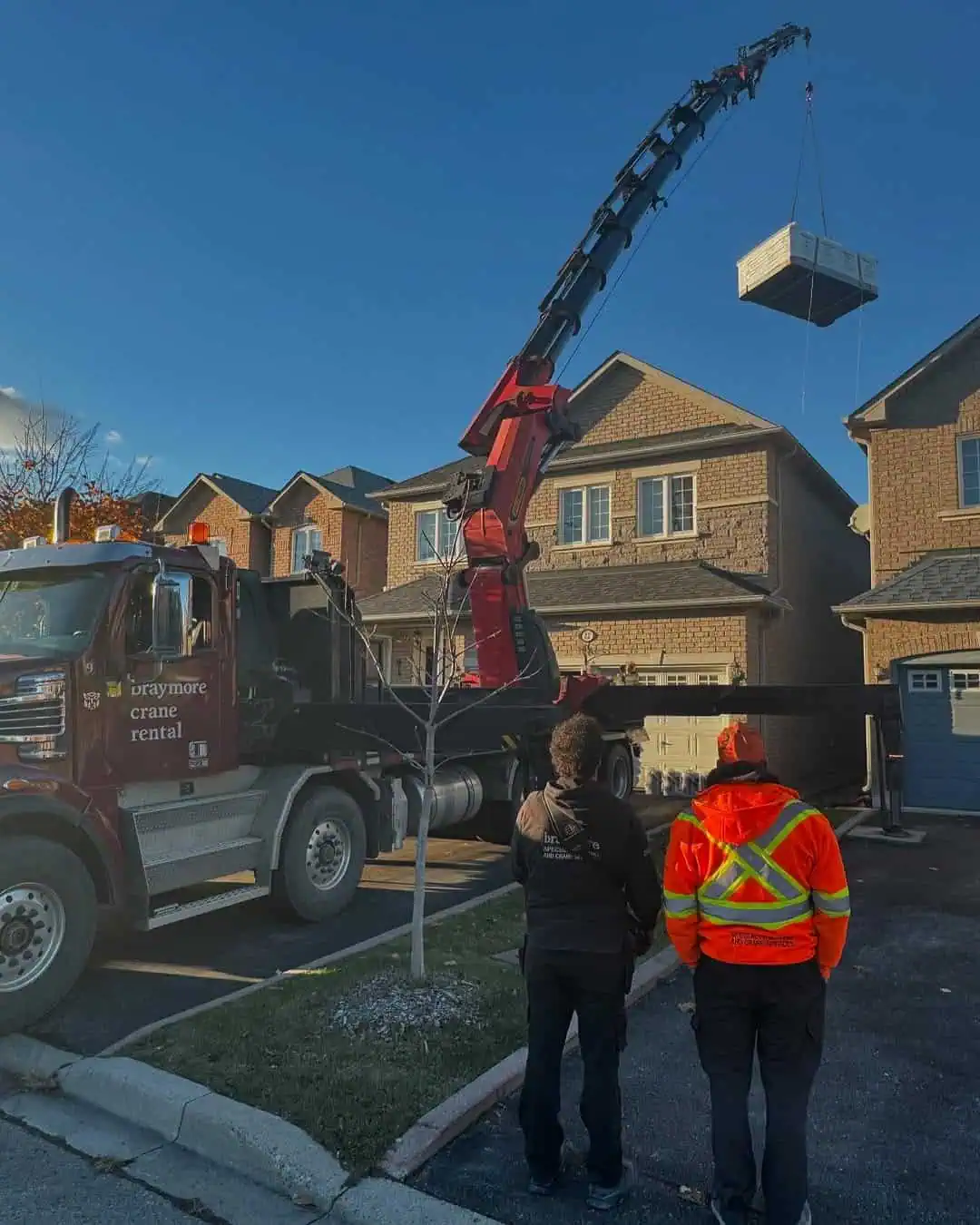 We are craning a swim spa into a backyard.