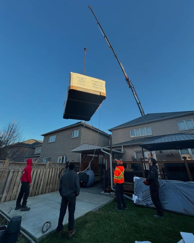 Swim spa going into a backyard.