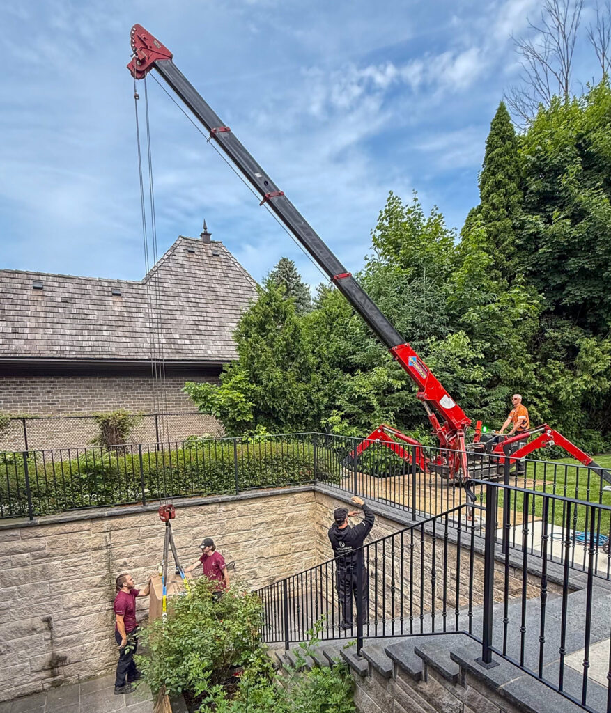 We are using a SpyderCrane to lower a 1200 pound safe to a walkout basement entrance.