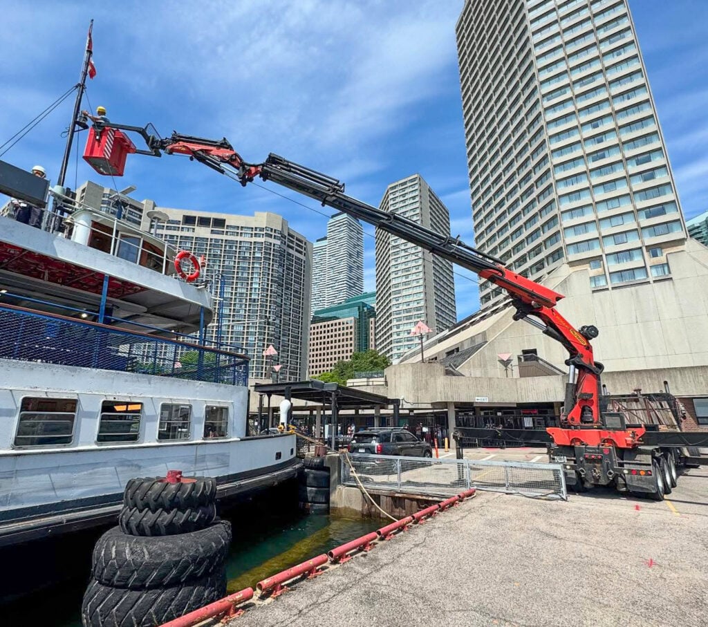 We are using a crane man basket to help service a ferry boat in Toronto harbour.
